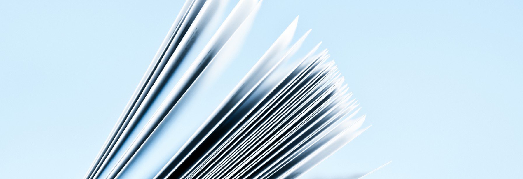Stack of papers on a blue background